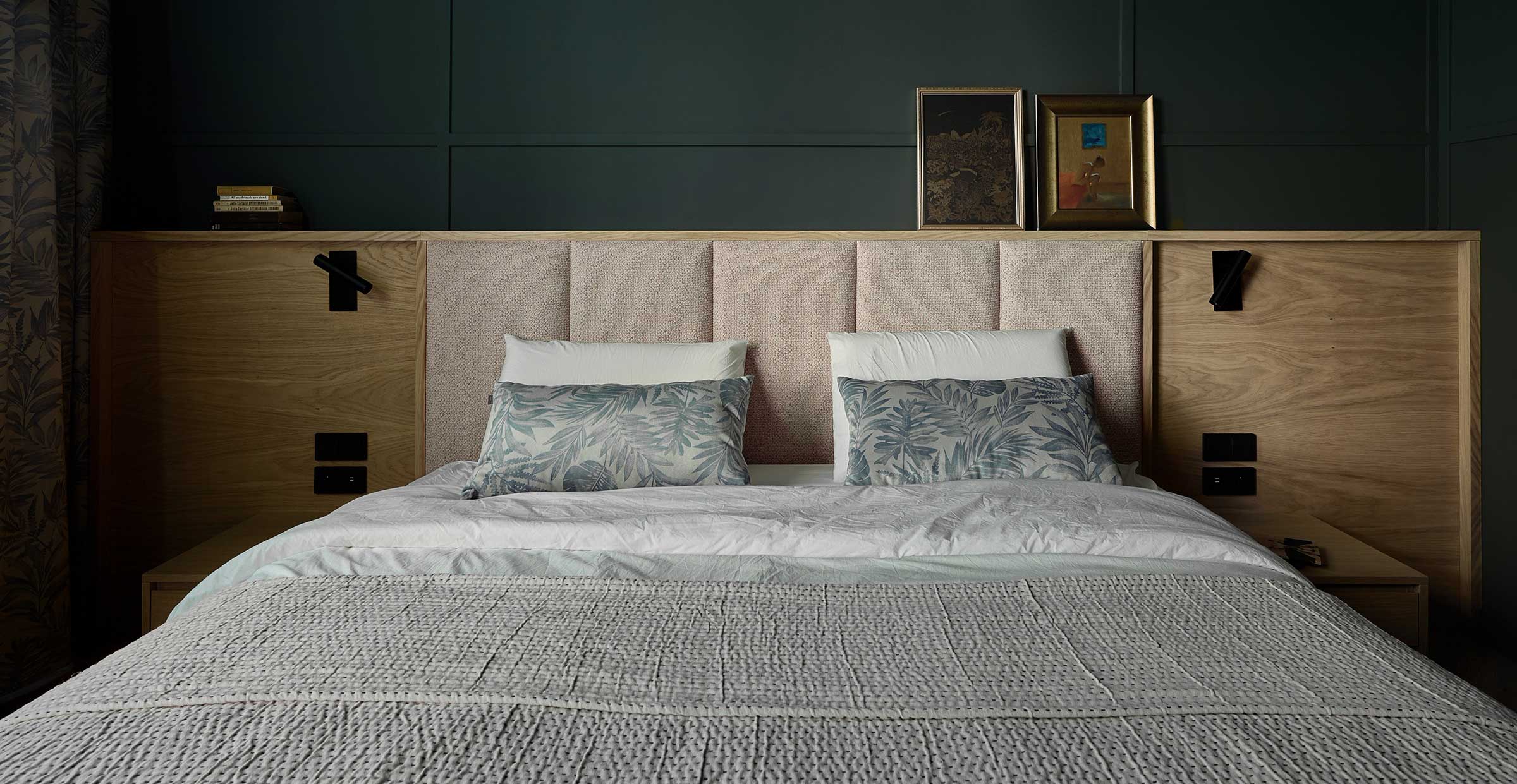 Warm-toned bedroom with wooden headboard