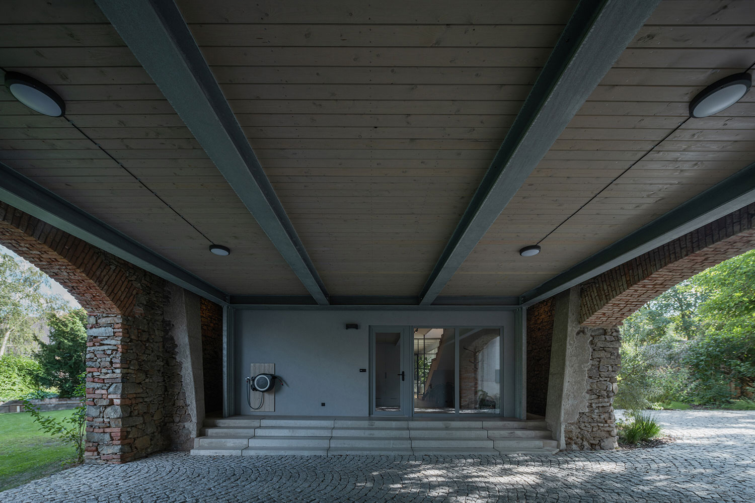 A Century-Old Barn Finds New Life as a Modern Family Home in Czech Republic