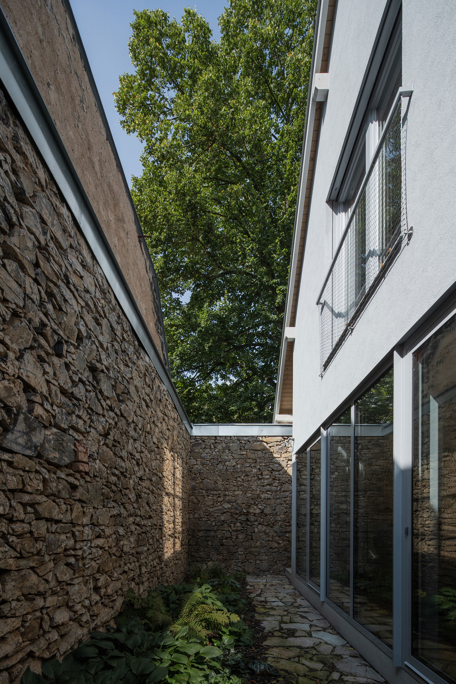 A Century-Old Barn Finds New Life as a Modern Family Home in Czech Republic