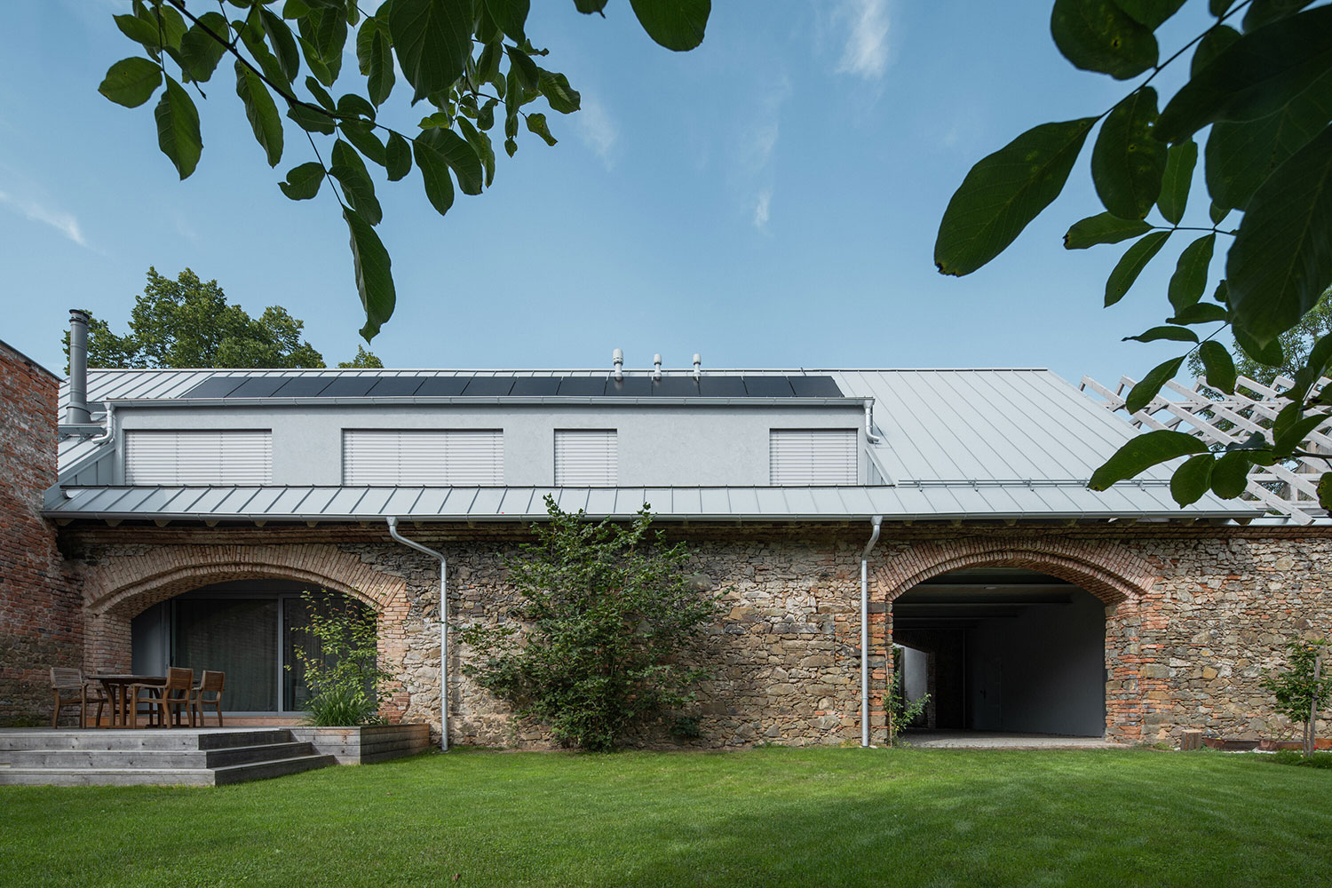 A Century-Old Barn Finds New Life as a Modern Family Home in Czech Republic