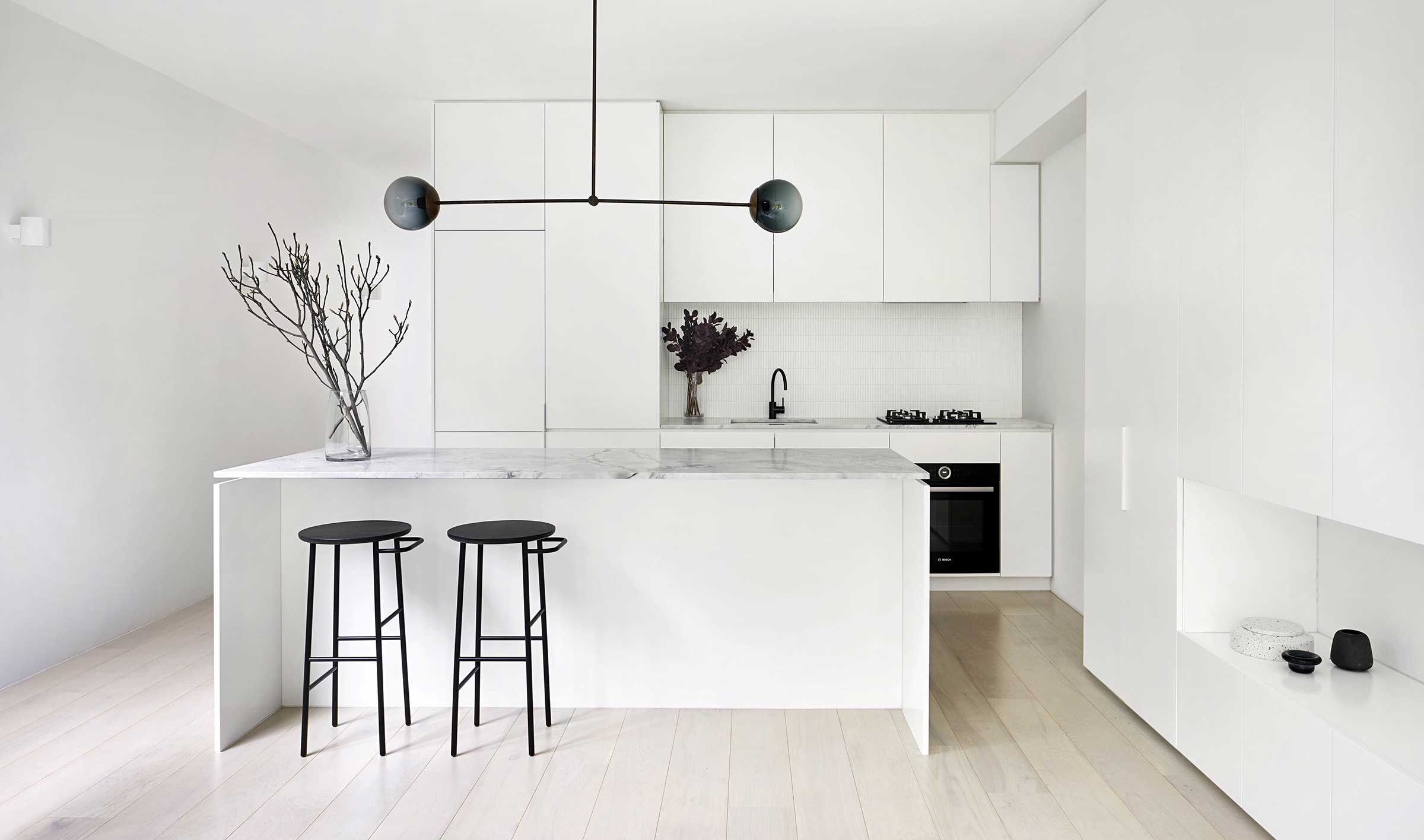 Modern all-white kitchen with island