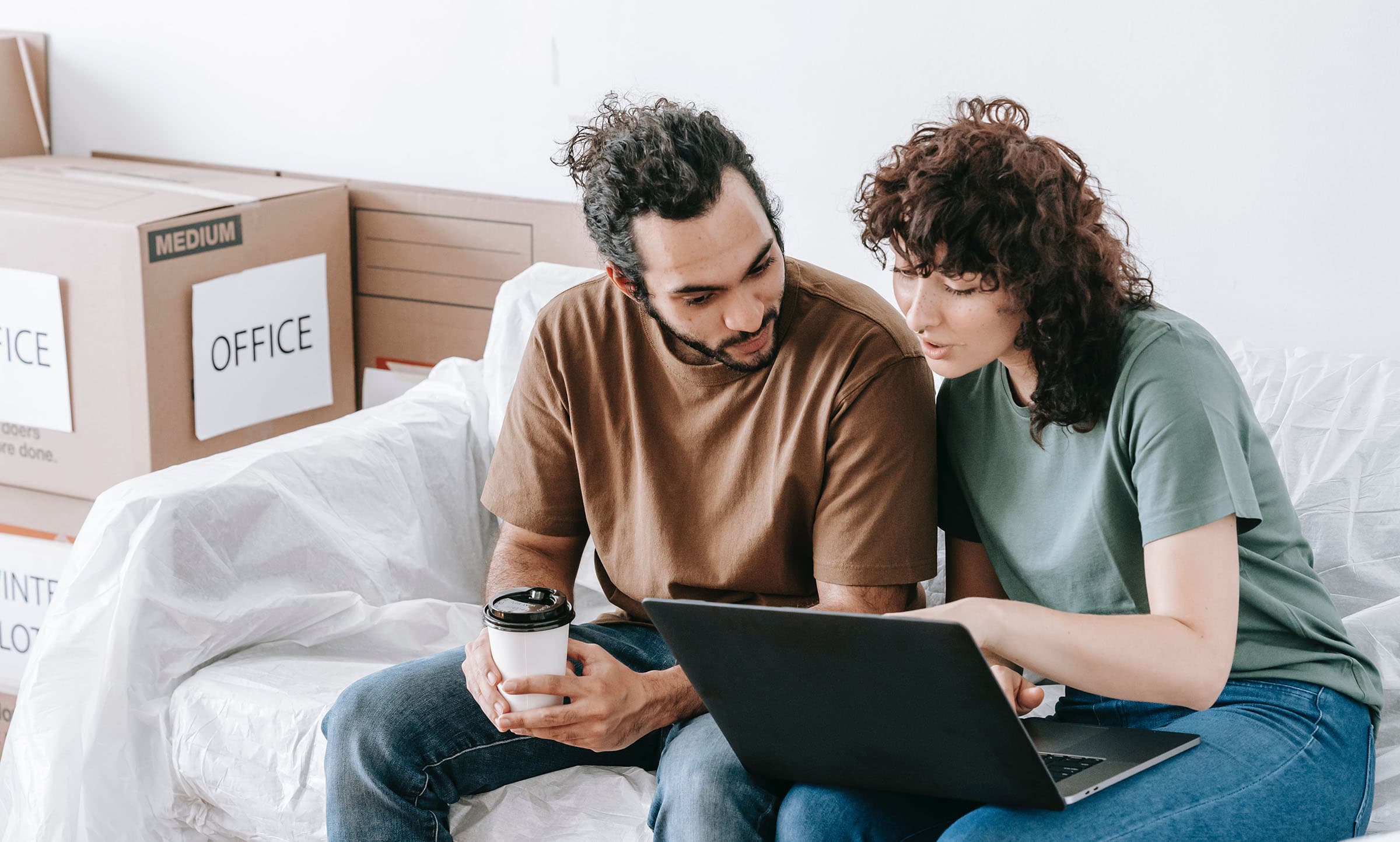 Couple Using A Laptop Computer