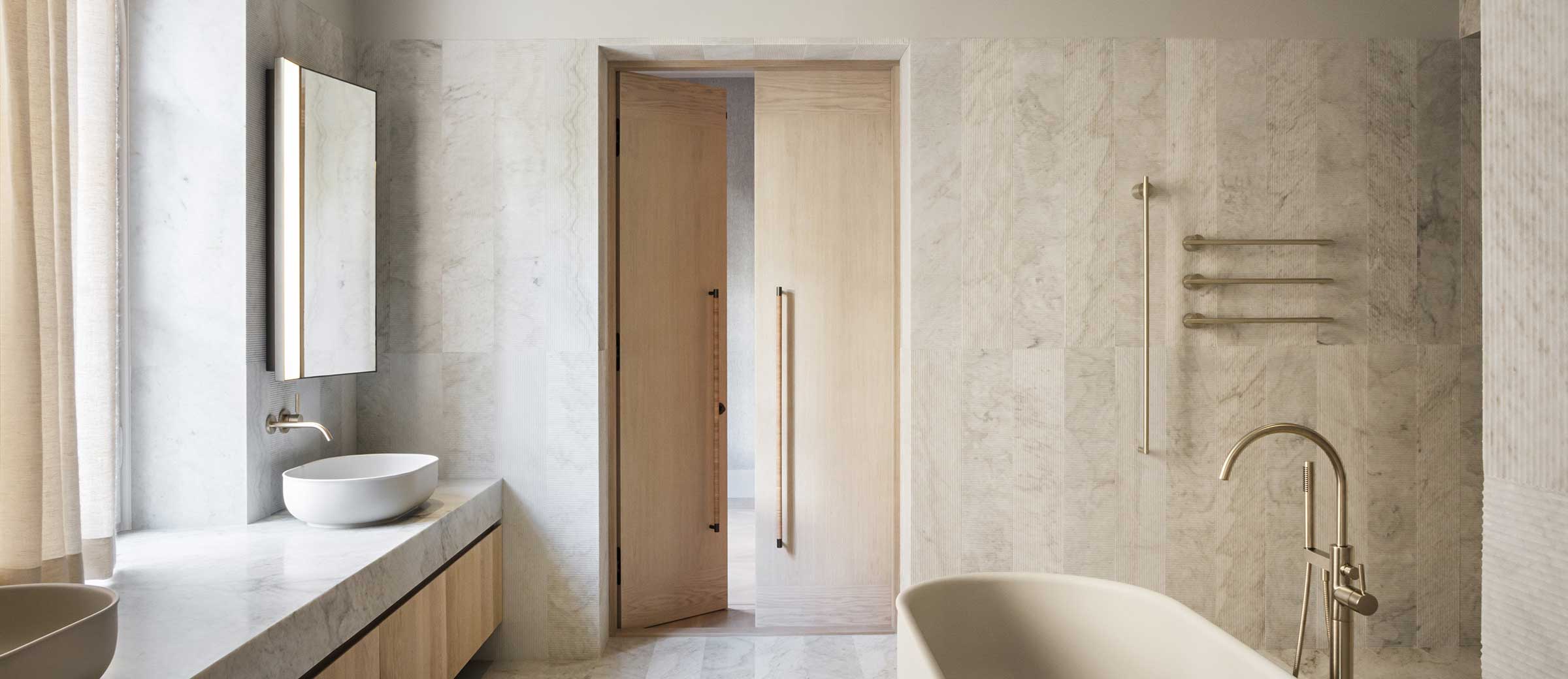 Modern travertine bathroom with freestanding bathtub