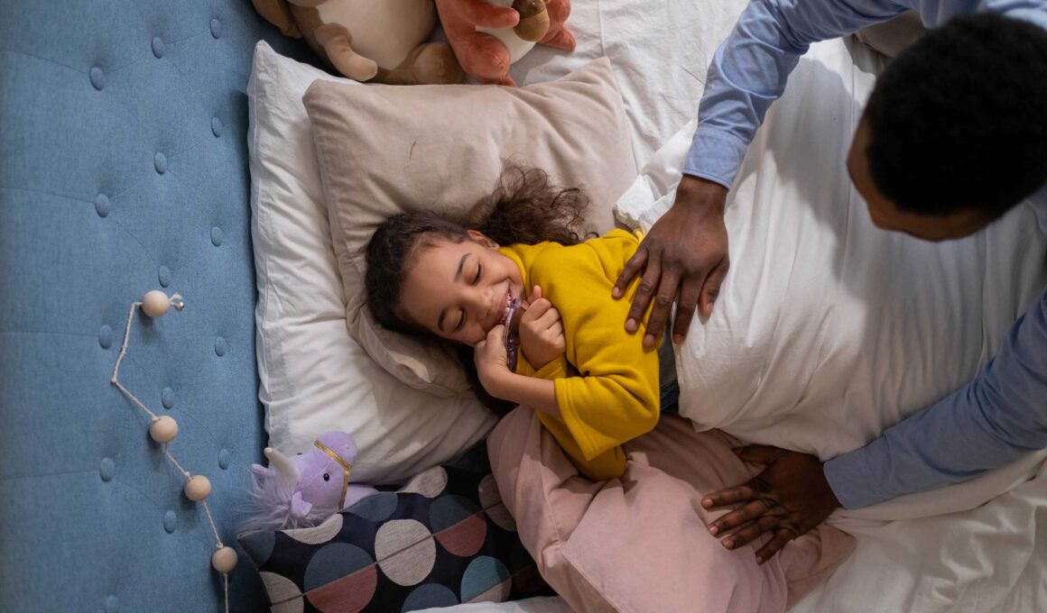 A Father Tucks His Daughter Into Bed