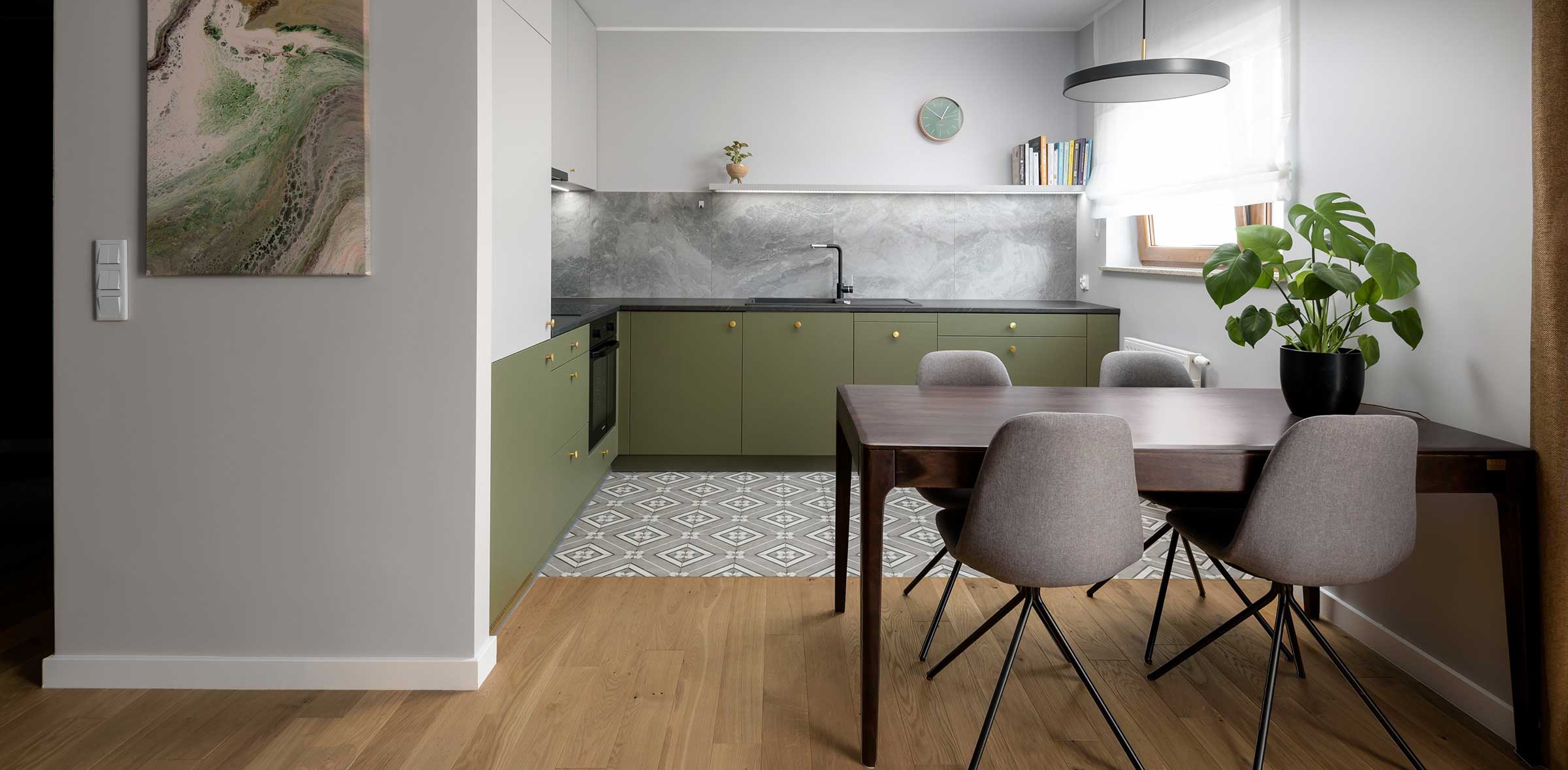 Modern kitchen with green cabinets