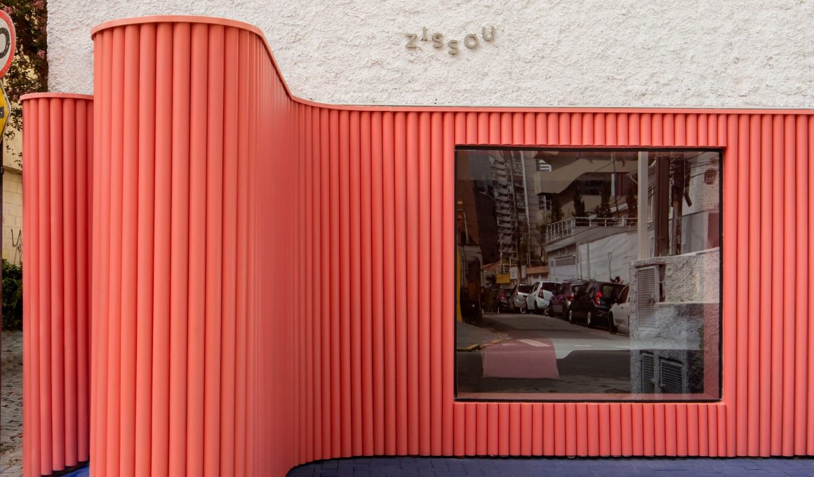 Coral Undulating Facade Envelops Brazilian Mattress Store Designed by Vaga Arquitetura and Pistache Ganache