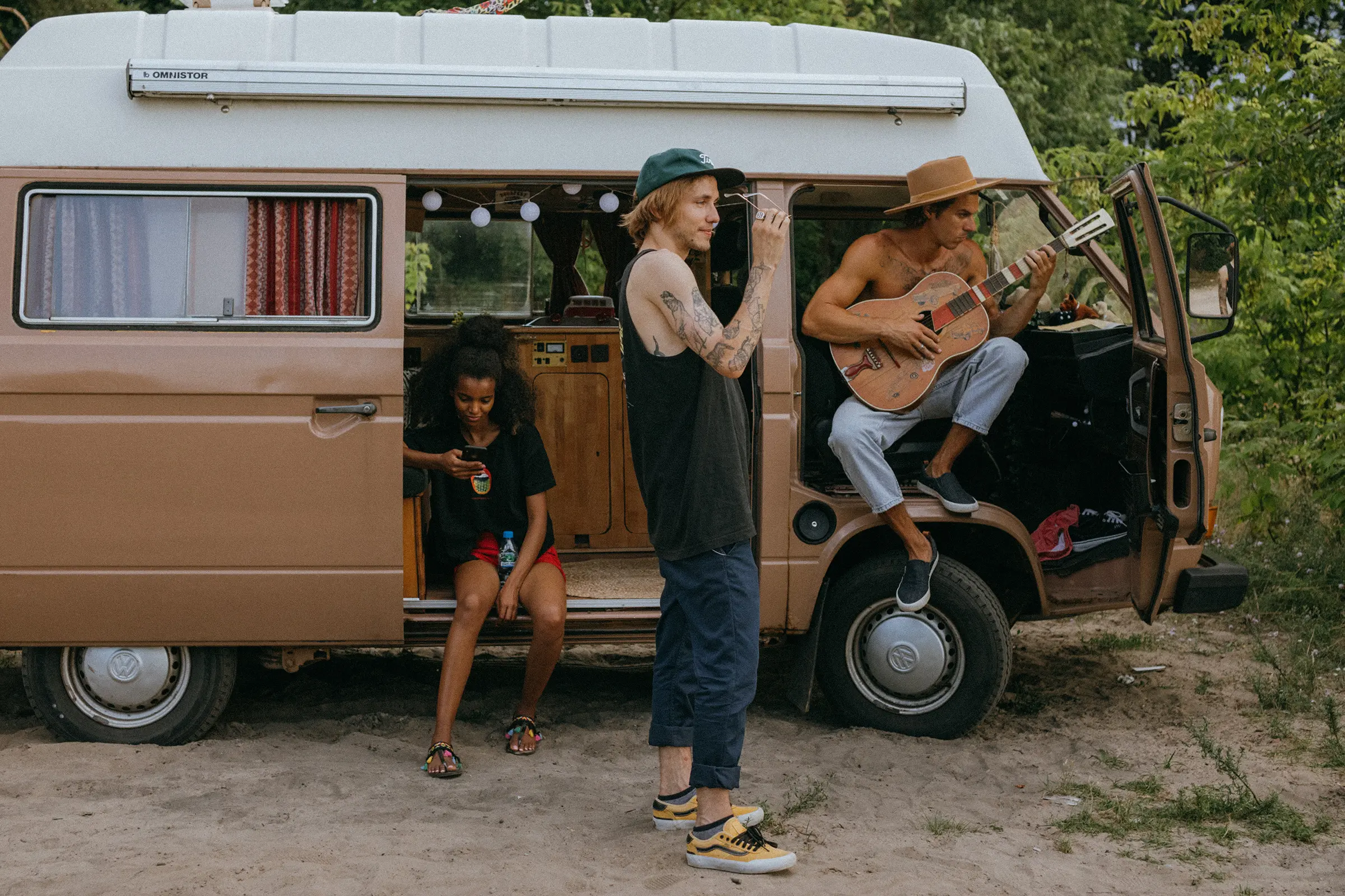 Group of friends traveling in a camper